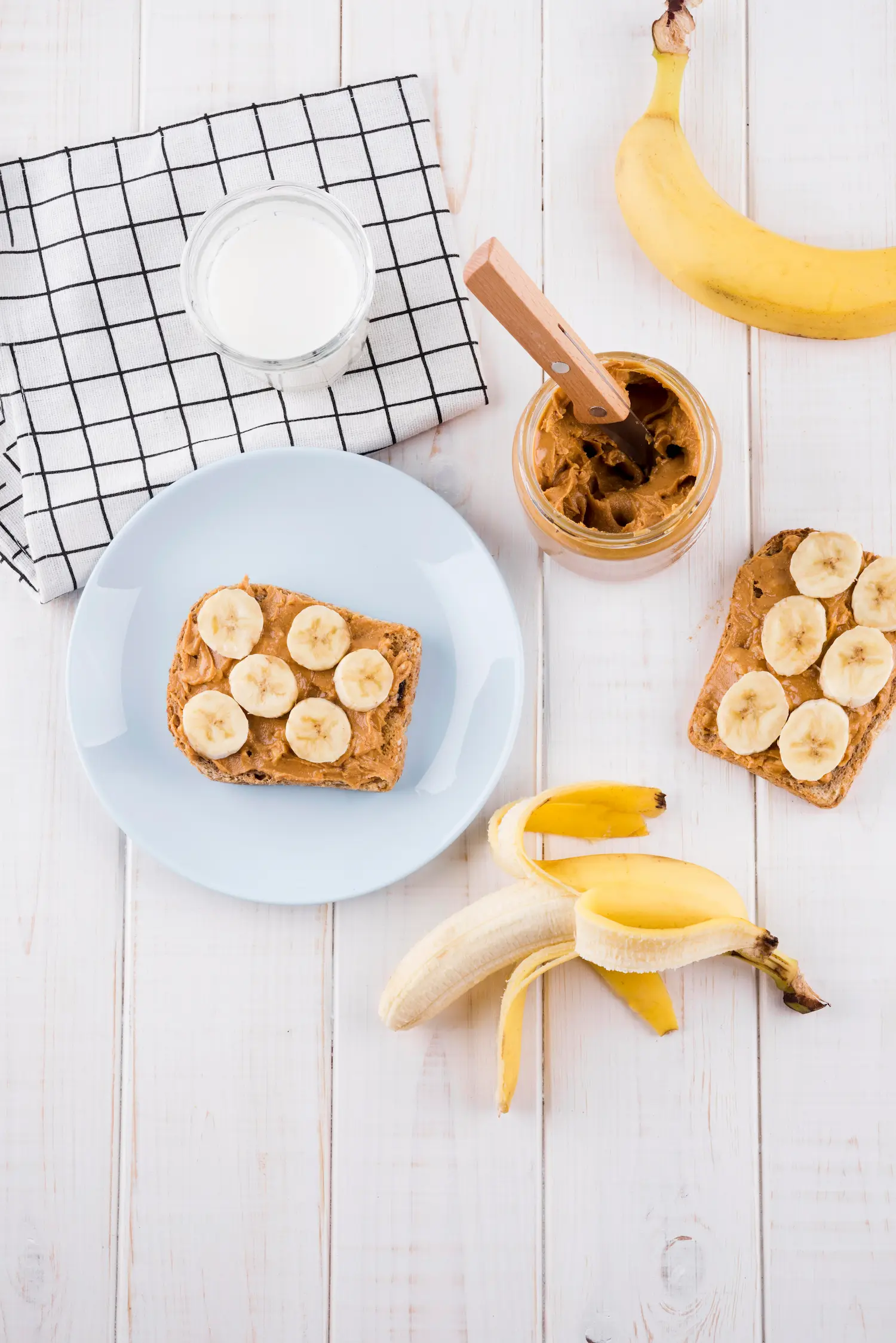 A clean, minimalist plate with stacked toast ready to eat at a desk