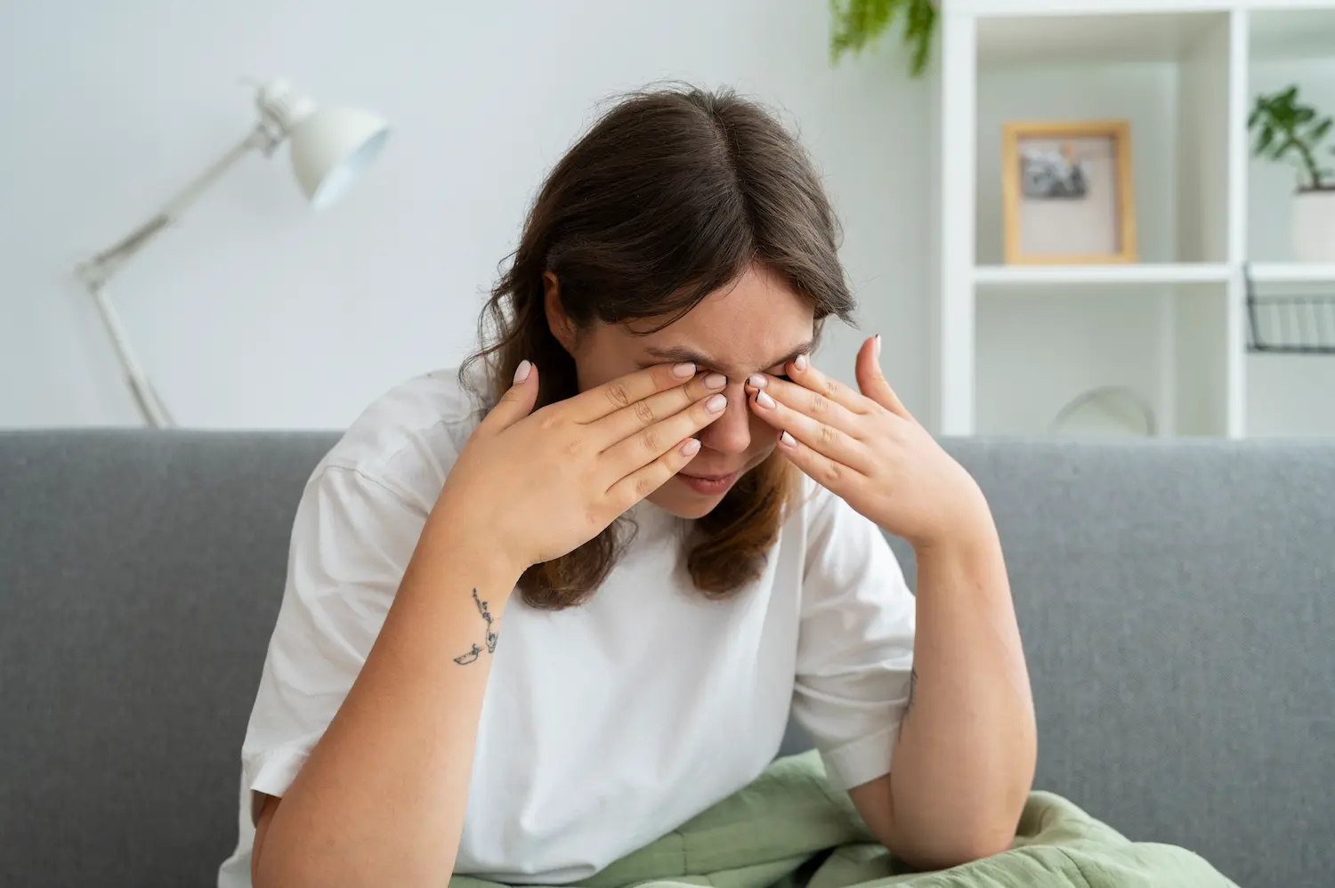 Person doing rapid blinking exercise to relieve dry eyes.