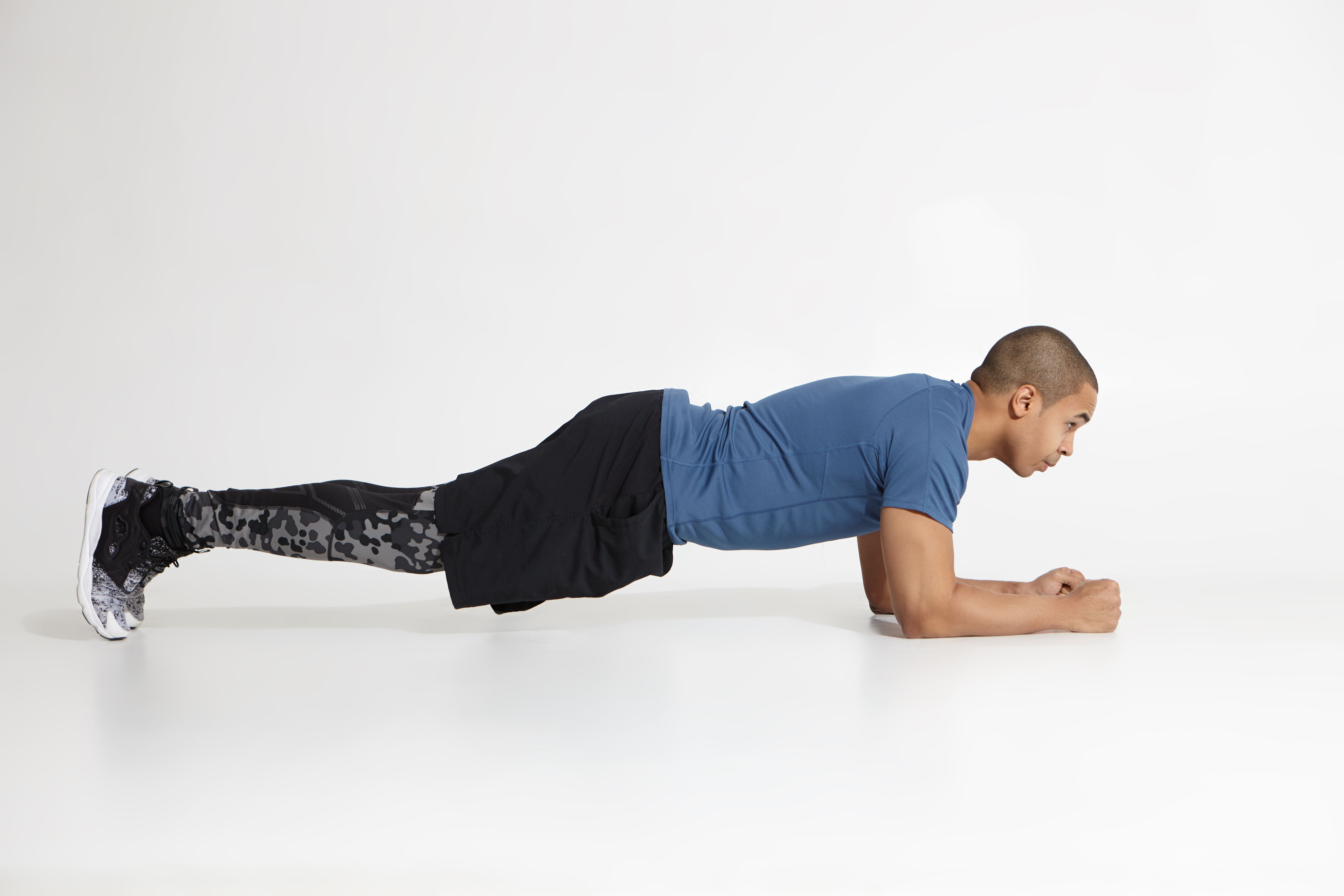 Person holding a plank
